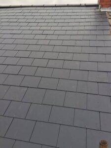 removal of old slate roof supplied and fitted a composite slate. new dry ridge 14