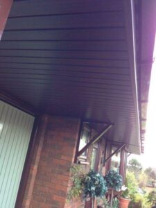rosewood fascia with white and rosewood soffit new gutters and dry verge 02 02