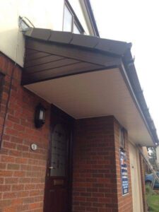 rosewood fascia with white and rosewood soffit new gutters and dry verge 05 05