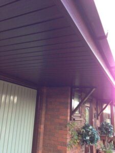 rosewood fascia with white and rosewood soffit new gutters and dry verge 08 08