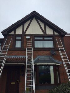 rosewood fascia with white and rosewood soffit new gutters and dry verge 11 11