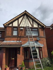 rosewood fascia with white and rosewood soffit new gutters and dry verge 12 12